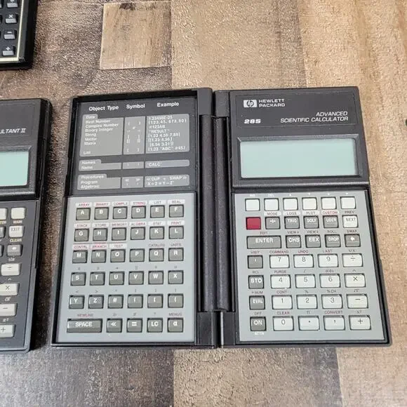 Lot of 4 Calculators HP 19B II, 12C, 28S, Texas Instruments TI-83 Plus For Parts - Picture 2 of 10